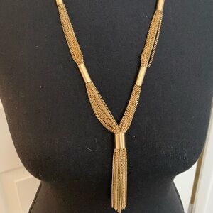 Unbranded gold tone 12 chain necklace with tassel